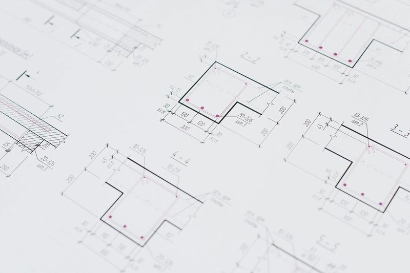 Structural engineering drawings showing concrete section details and reinforcement schedules